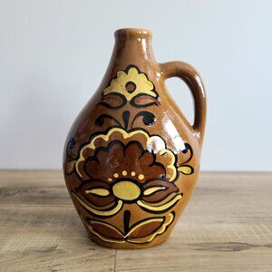 Hand hand painted glazed ceramic midcentury vase/pitcher with floral design.